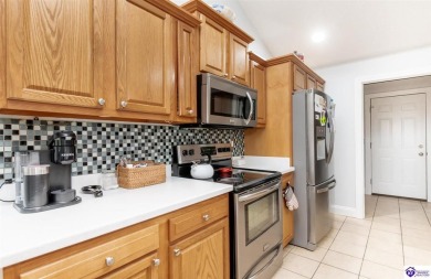 Discover comfort and style in this spacious 3-bedroom on Hillcrest Country Club in Kentucky - for sale on GolfHomes.com, golf home, golf lot