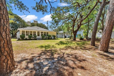 Adorable beach cottage situated just one short block (450 feet) on Beachwood Golf Club in South Carolina - for sale on GolfHomes.com, golf home, golf lot