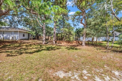 Adorable beach cottage situated just one short block (450 feet) on Beachwood Golf Club in South Carolina - for sale on GolfHomes.com, golf home, golf lot