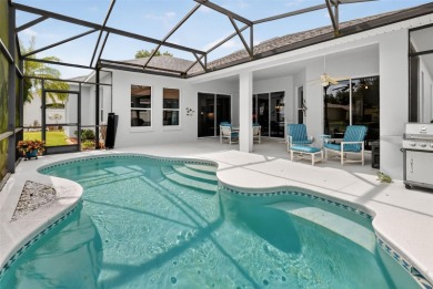 Welcome to this beautifully landscaped Scarsborough model pool on Monarch At Royal Highlands in Florida - for sale on GolfHomes.com, golf home, golf lot