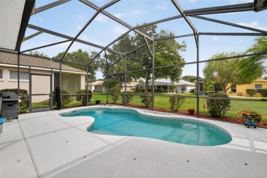 Welcome to this beautifully landscaped Scarsborough model pool on Monarch At Royal Highlands in Florida - for sale on GolfHomes.com, golf home, golf lot