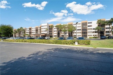 Spacious and well-maintained 2-bedroom, 2-bath condo offering on Jim McLean Signature Course in Florida - for sale on GolfHomes.com, golf home, golf lot