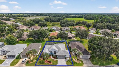 Welcome to this beautifully landscaped Scarsborough model pool on Monarch At Royal Highlands in Florida - for sale on GolfHomes.com, golf home, golf lot