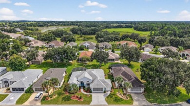 Welcome to this beautifully landscaped Scarsborough model pool on Monarch At Royal Highlands in Florida - for sale on GolfHomes.com, golf home, golf lot