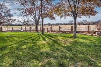 Discover elegance and comfort in this stunning 4-bedroom on Palo Duro Creek Golf Club in Texas - for sale on GolfHomes.com, golf home, golf lot