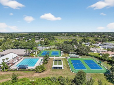 Welcome to this beautifully landscaped Scarsborough model pool on Monarch At Royal Highlands in Florida - for sale on GolfHomes.com, golf home, golf lot