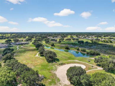 Welcome to this beautifully landscaped Scarsborough model pool on Monarch At Royal Highlands in Florida - for sale on GolfHomes.com, golf home, golf lot