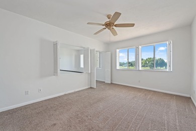 Enjoy breathtaking views of the lake and golf course from this on  in Florida - for sale on GolfHomes.com, golf home, golf lot