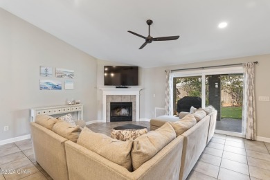 Nestled on an oversized lot, this single-level brick home in on Santa Rosa Golf and Beach Club in Florida - for sale on GolfHomes.com, golf home, golf lot
