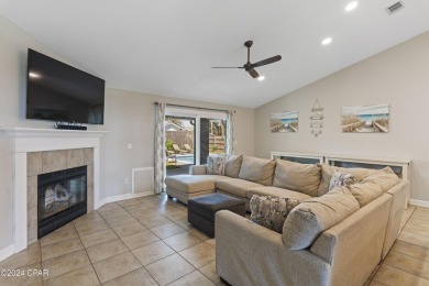 Nestled on an oversized lot, this single-level brick home in on Santa Rosa Golf and Beach Club in Florida - for sale on GolfHomes.com, golf home, golf lot