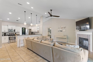 Nestled on an oversized lot, this single-level brick home in on Santa Rosa Golf and Beach Club in Florida - for sale on GolfHomes.com, golf home, golf lot