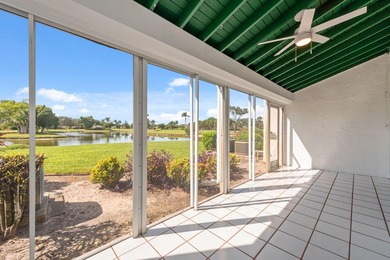 Enjoy breathtaking views of the lake and golf course from this on  in Florida - for sale on GolfHomes.com, golf home, golf lot