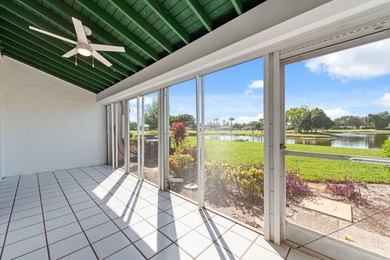 Enjoy breathtaking views of the lake and golf course from this on  in Florida - for sale on GolfHomes.com, golf home, golf lot