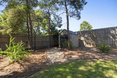 Nestled on an oversized lot, this single-level brick home in on Santa Rosa Golf and Beach Club in Florida - for sale on GolfHomes.com, golf home, golf lot