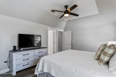 Nestled on an oversized lot, this single-level brick home in on Santa Rosa Golf and Beach Club in Florida - for sale on GolfHomes.com, golf home, golf lot