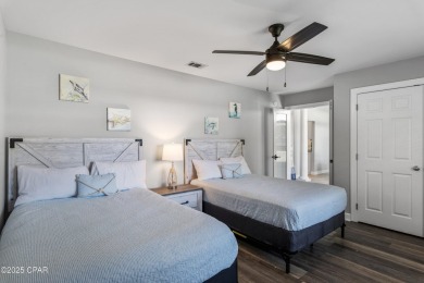 Nestled on an oversized lot, this single-level brick home in on Santa Rosa Golf and Beach Club in Florida - for sale on GolfHomes.com, golf home, golf lot
