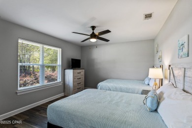 Nestled on an oversized lot, this single-level brick home in on Santa Rosa Golf and Beach Club in Florida - for sale on GolfHomes.com, golf home, golf lot