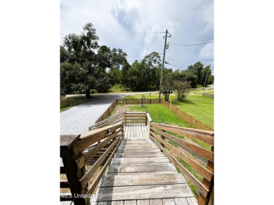 This charming 2 bedroom/2 bath home sits in a picturesque golf on The Bridges Golf Club At Hollywood Casino in Mississippi - for sale on GolfHomes.com, golf home, golf lot