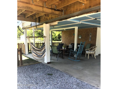 This charming 2 bedroom/2 bath home sits in a picturesque golf on The Bridges Golf Club At Hollywood Casino in Mississippi - for sale on GolfHomes.com, golf home, golf lot