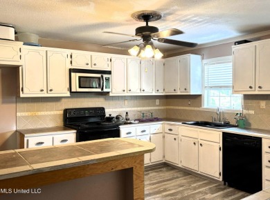 This charming 2 bedroom/2 bath home sits in a picturesque golf on The Bridges Golf Club At Hollywood Casino in Mississippi - for sale on GolfHomes.com, golf home, golf lot