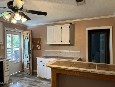 This charming 2 bedroom/2 bath home sits in a picturesque golf on The Bridges Golf Club At Hollywood Casino in Mississippi - for sale on GolfHomes.com, golf home, golf lot