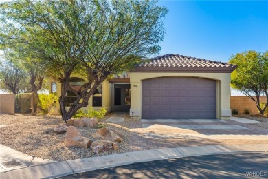 Spectacular 3-Bed, 2-Bath Former Model Home with Stunning Casino on Laughlin Ranch Golf Club in Arizona - for sale on GolfHomes.com, golf home, golf lot