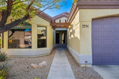 Spectacular 3-Bed, 2-Bath Former Model Home with Stunning Casino on Laughlin Ranch Golf Club in Arizona - for sale on GolfHomes.com, golf home, golf lot