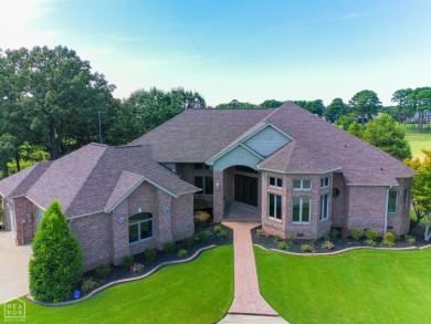 This stunning all-brick home, has been completely remodeled to on RidgePointe Country Club in Arkansas - for sale on GolfHomes.com, golf home, golf lot