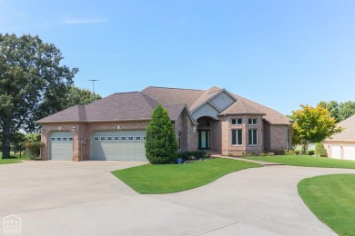This stunning all-brick home, has been completely remodeled to on RidgePointe Country Club in Arkansas - for sale on GolfHomes.com, golf home, golf lot