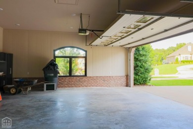 This stunning all-brick home, has been completely remodeled to on RidgePointe Country Club in Arkansas - for sale on GolfHomes.com, golf home, golf lot