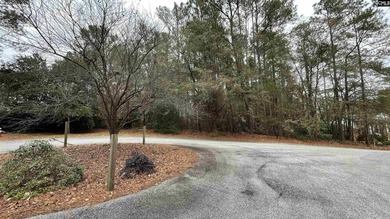 Build your dream home on this gently rolling and wooded lot in on Spring Valley Country Club in South Carolina - for sale on GolfHomes.com, golf home, golf lot