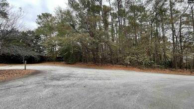 Build your dream home on this gently rolling and wooded lot in on Spring Valley Country Club in South Carolina - for sale on GolfHomes.com, golf home, golf lot