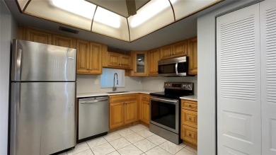 Spacious 2/2 condo in the desirable 55+ community of Palm on Oriole Golf and Tennis Club in Florida - for sale on GolfHomes.com, golf home, golf lot