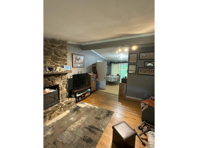 If you are looking for a smaller house with a big big yard on a on Cherokee Village North Course in Arkansas - for sale on GolfHomes.com, golf home, golf lot