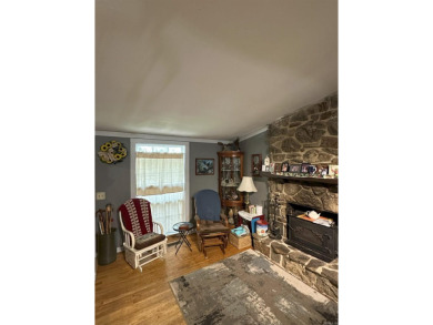 If you are looking for a smaller house with a big big yard on a on Cherokee Village North Course in Arkansas - for sale on GolfHomes.com, golf home, golf lot