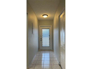 Spacious 2/2 condo in the desirable 55+ community of Palm on Oriole Golf and Tennis Club in Florida - for sale on GolfHomes.com, golf home, golf lot