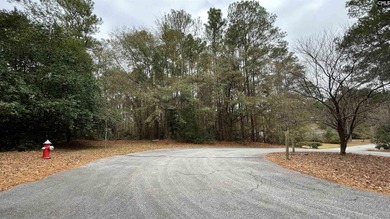 Build your dream home on this gently rolling and wooded lot in on Spring Valley Country Club in South Carolina - for sale on GolfHomes.com, golf home, golf lot
