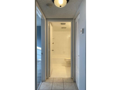 Spacious 2/2 condo in the desirable 55+ community of Palm on Oriole Golf and Tennis Club in Florida - for sale on GolfHomes.com, golf home, golf lot