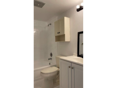 Spacious 2/2 condo in the desirable 55+ community of Palm on Oriole Golf and Tennis Club in Florida - for sale on GolfHomes.com, golf home, golf lot