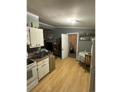 If you are looking for a smaller house with a big big yard on a on Cherokee Village North Course in Arkansas - for sale on GolfHomes.com, golf home, golf lot