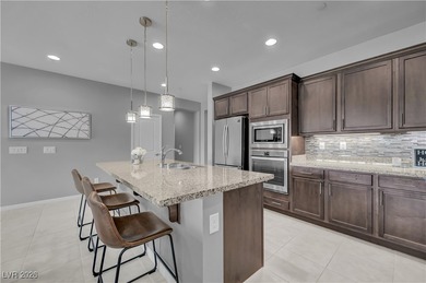 This immaculate and inviting single story home overlooks the 7th on Tuscany Golf Club in Nevada - for sale on GolfHomes.com, golf home, golf lot