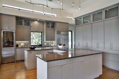 This custom-built contemporary masterpiece exudes refined on Mira Vista Country Club in Texas - for sale on GolfHomes.com, golf home, golf lot