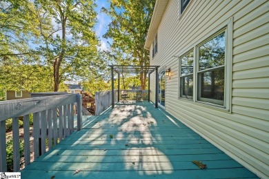 From the colorful front door, to the playful kitchen cupboards on Pebble Creek Golf Club in South Carolina - for sale on GolfHomes.com, golf home, golf lot