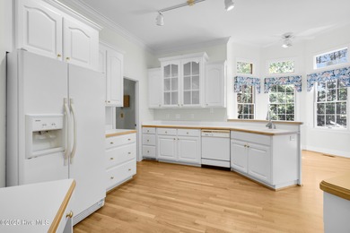 Discover timeless elegance in this custom brick home nestled in on Emerald Golf Club in North Carolina - for sale on GolfHomes.com, golf home, golf lot