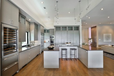 This custom-built contemporary masterpiece exudes refined on Mira Vista Country Club in Texas - for sale on GolfHomes.com, golf home, golf lot