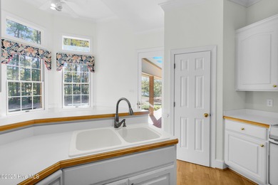 Discover timeless elegance in this custom brick home nestled in on Emerald Golf Club in North Carolina - for sale on GolfHomes.com, golf home, golf lot