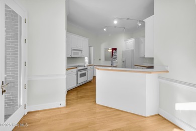 Discover timeless elegance in this custom brick home nestled in on Emerald Golf Club in North Carolina - for sale on GolfHomes.com, golf home, golf lot