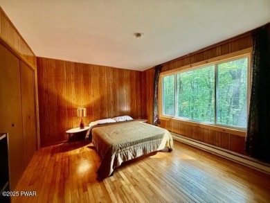 Hemlock Farm's gated community you will find this sweet woodland on Lords Valley Country Club, Inc in Pennsylvania - for sale on GolfHomes.com, golf home, golf lot