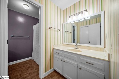 From the colorful front door, to the playful kitchen cupboards on Pebble Creek Golf Club in South Carolina - for sale on GolfHomes.com, golf home, golf lot