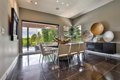 This custom-built contemporary masterpiece exudes refined on Mira Vista Country Club in Texas - for sale on GolfHomes.com, golf home, golf lot
